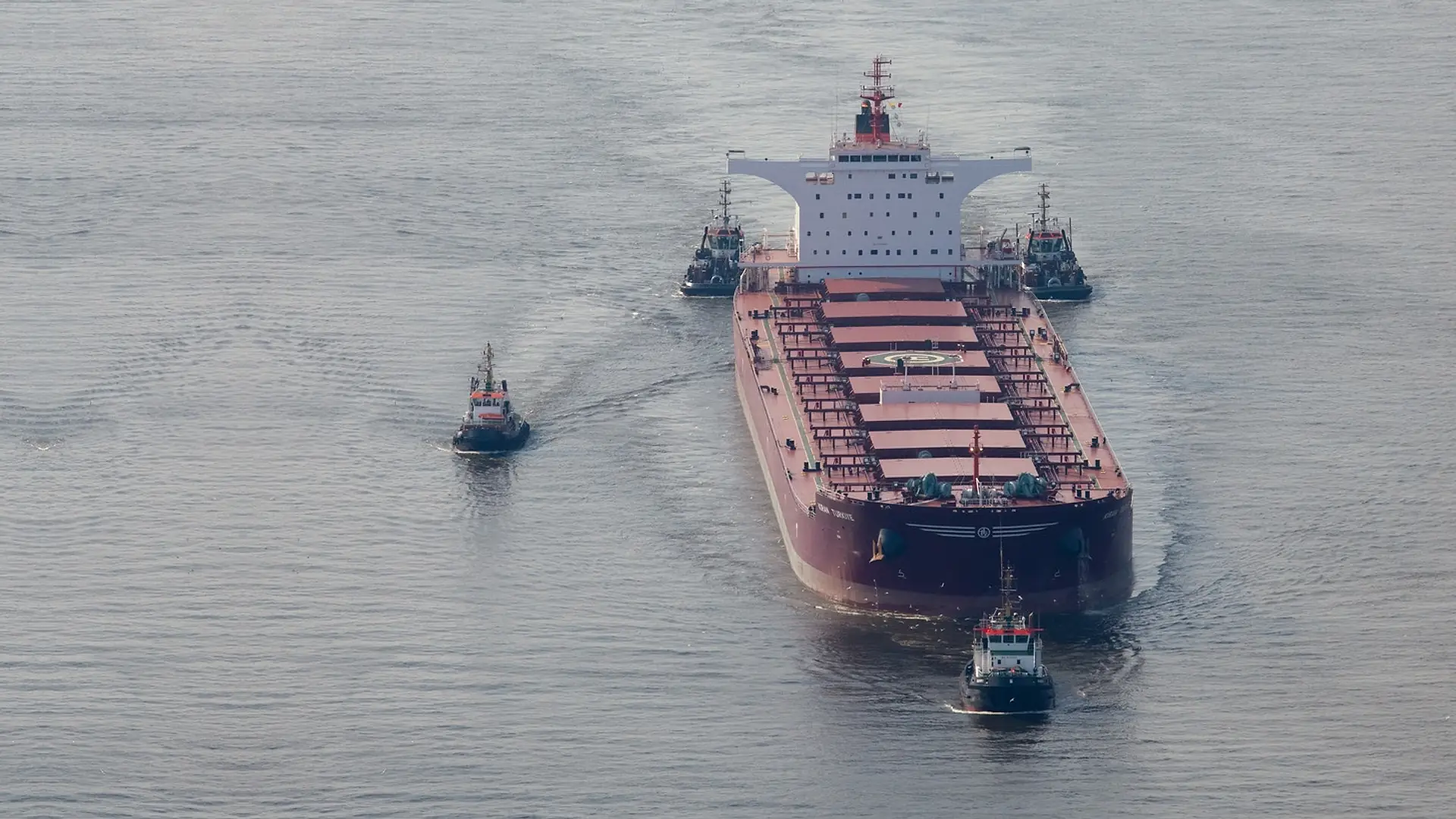 M/V KIRAN TURKIYE, Capesize bulk carrier, escorted by tugs